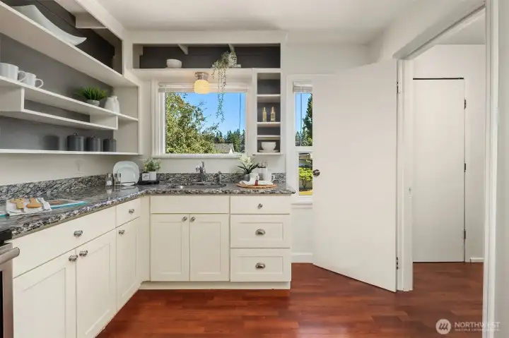 Kitchen overlooking the spacious backyard.