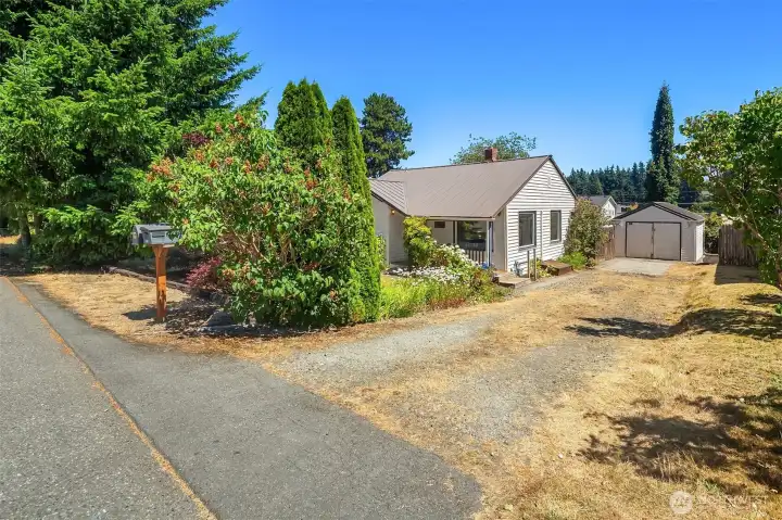 Off street parking leading to detached garage.