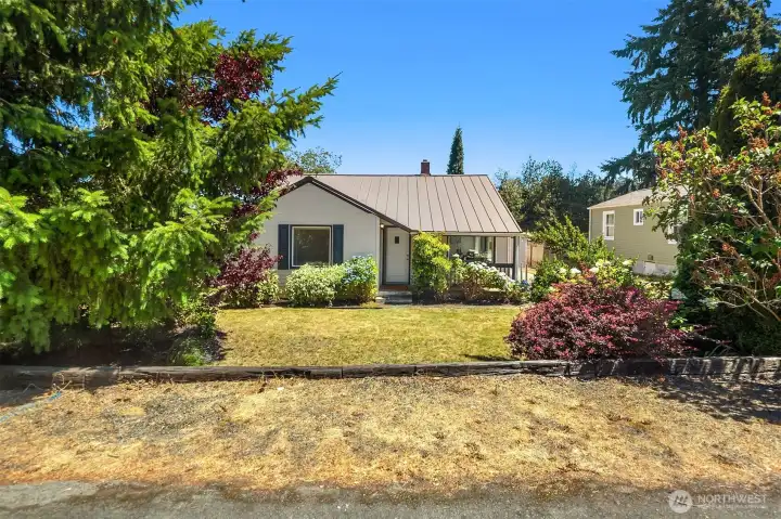 Spacious front yard with additional front off-street parking.