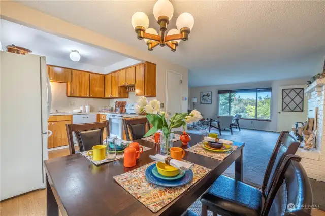 Large dining area bridge the space between the living room and the kitchen.