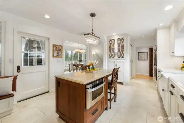 The microwave drawer and Thermador double ovens are just a few of the upgraded appliances. There is also a full size built-in freezer, refrigerator and built-in dishwasher for a fresh and seamless look