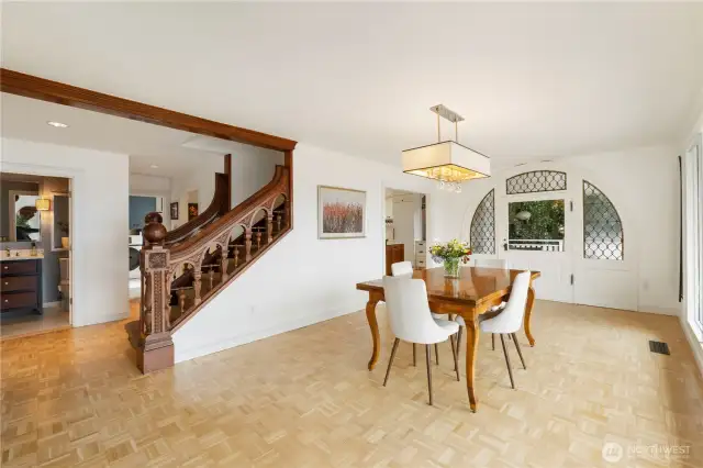 The doorway leading to the covered outdoor dining area in this grand dining room is another show stopping feature.