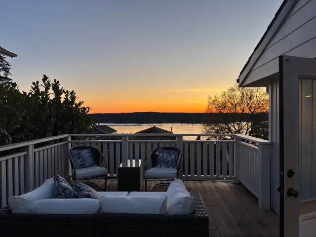 Seller photo of sunset from the upper primary suite deck on 4/17