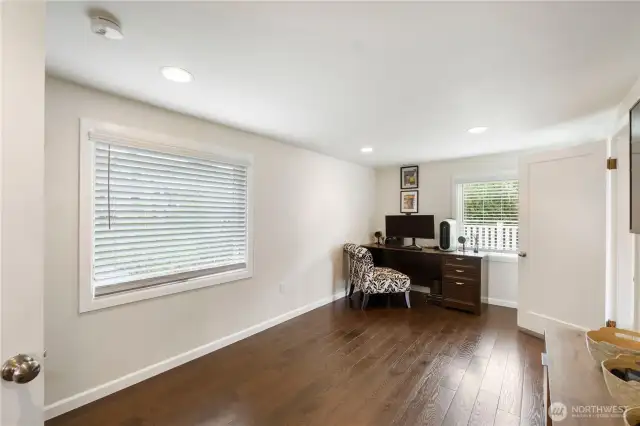 The 4th bedroom is situated on the upper level across from the primary suite and makes a perfect office or nursery - whatever your ideal use of the space may be