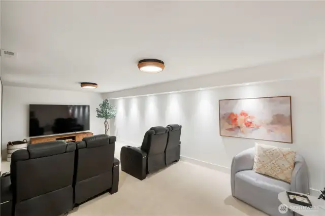 Host movie night in the theatre room with custom lighting and room for your biggest crew.