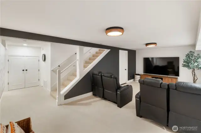 Even more closet space and the door off the theatre room leads to the utility room with workshop and more storage. A new heat pump A/C, electrical panel (2022) and hot water circulating pump are a few more upgrades to the home