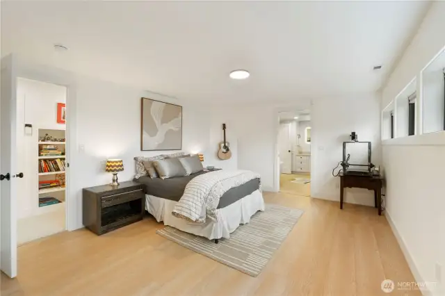 The lower level suite features Luxury Vinyl Tile Flooring and cheery windows overlooking the grounds.