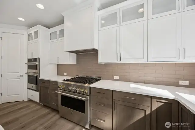 gas range/oven plus mounted second oven/micro combo.