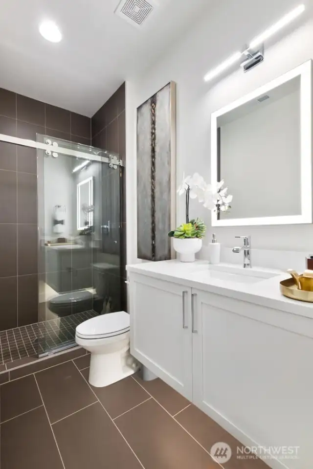 Photo from same plan, different community. Interior finishes may vary. Main floor 3/4 bath.