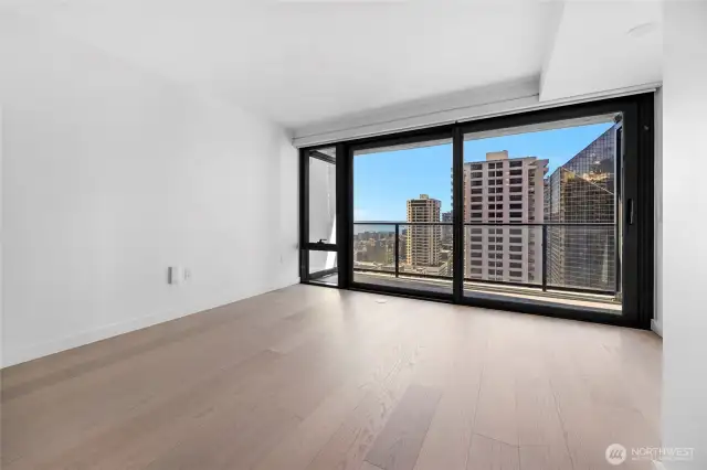 Triple-pane ground to ceiling insulated glass doors.