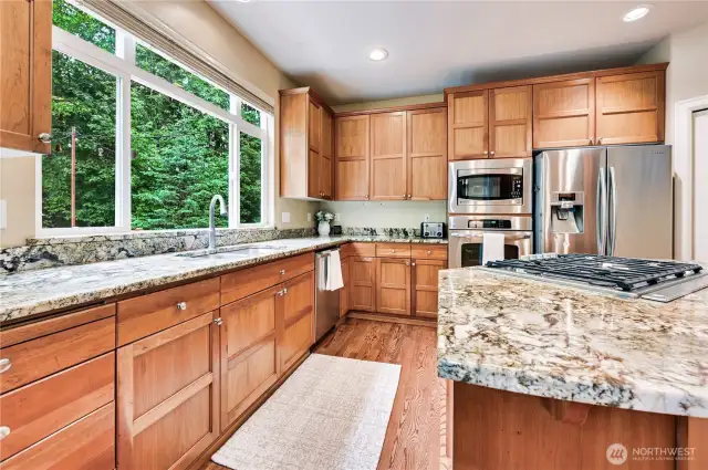 Kitchen with beautiful cabinetry and granite counters