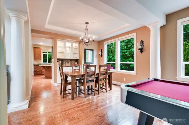 Fantastic Dining Room with built-in cabinetry and glass doors