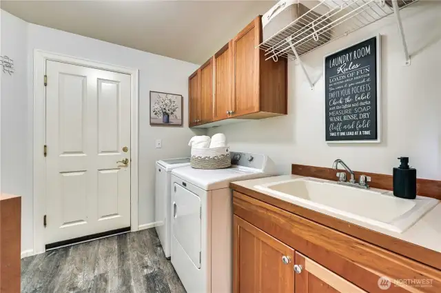 Laundry Room with cabinets and sink