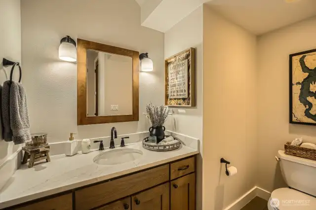 Downstairs powder room with recently updated quartz countertop