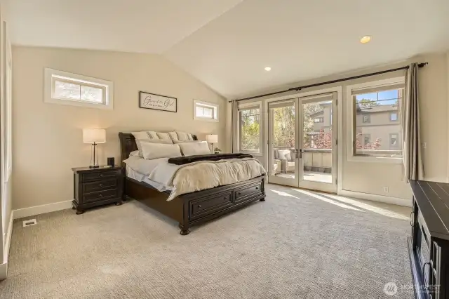 Massive primary bedroom with french doors and power blinds leading to your private patio to soak up the morning sun.