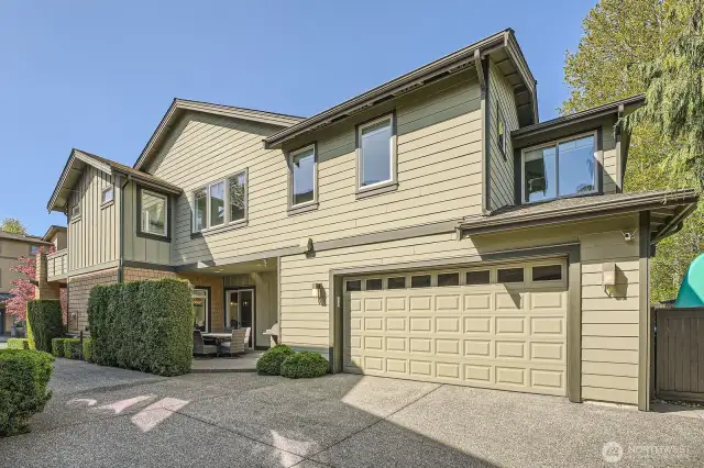 Large two car garage with ample storage space