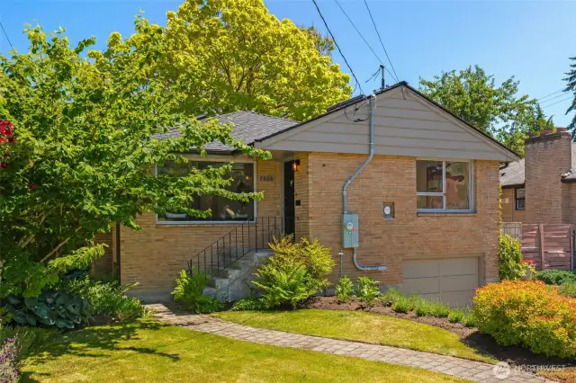 Set on a lush level lot in the Ravenna Bryant neighborhood.