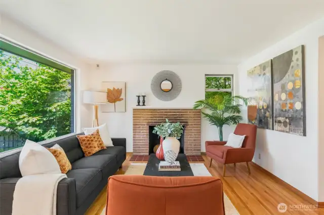 The wood burning fireplace is the focal point of the living room.