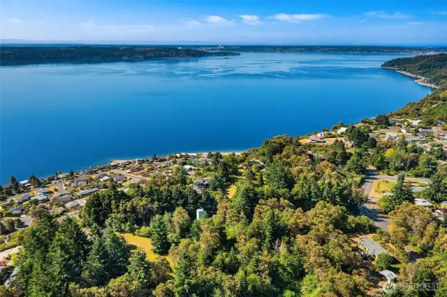 Near the lovely Maury Island Marine park with miles of awesome trails.  Plus easy bus access to the village of Vashon and the north end ferries.