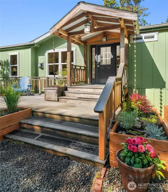 Trex deck and lots of raised bed planters for veggies or flowers!