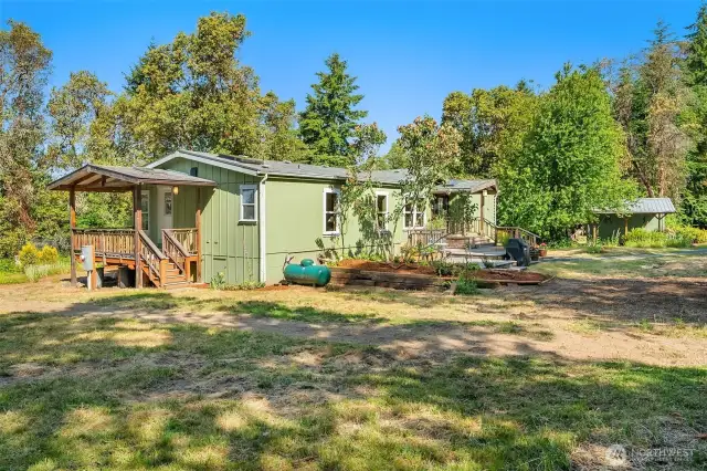 The home is well-situated on the sunny property.