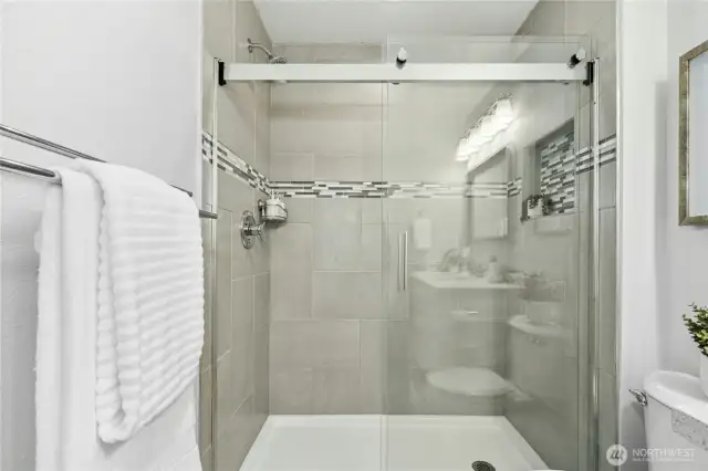 Owner Suite is totally remodeled with designer tile and quartz!