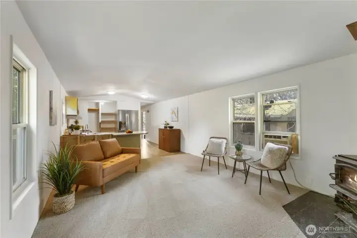 Open & bright floor plan with 2 primary bedrooms.