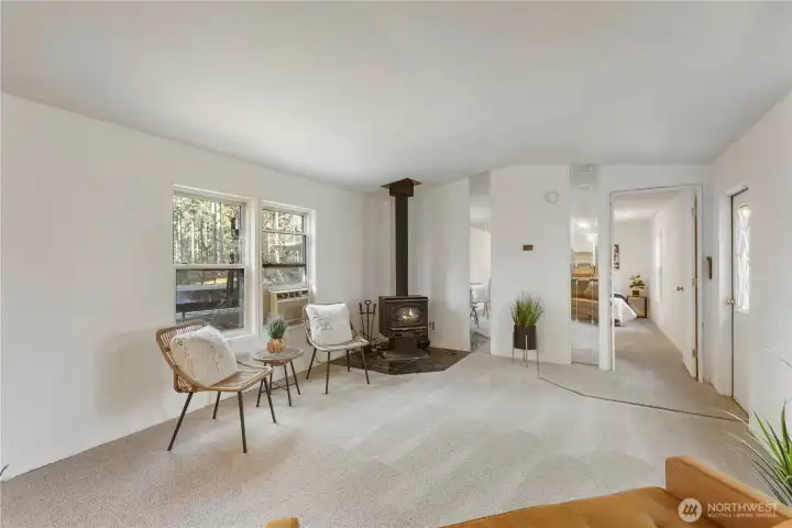 Cozy wood-burning fireplace will heat the entire home.