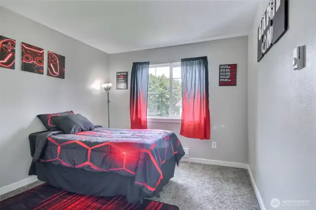 Cozy and bright guest bedroom offering convenience & comfort for anyone who decides to stay over.