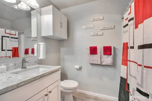 Full Bathroom with washer and dryer