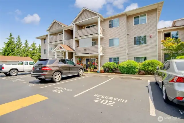 Very back of the complex with your private parking spot just for you. Additional parking for your guests/ visitors against the fence.