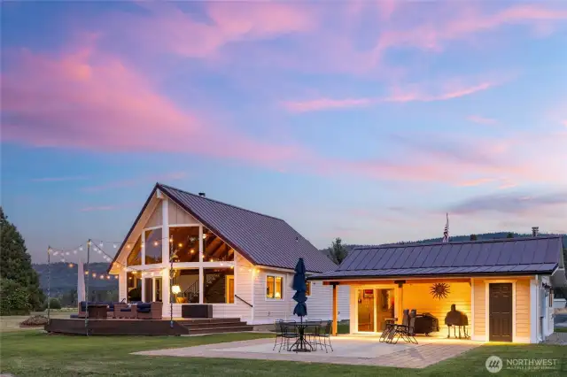 The front deck off the main home and the patio in front of "The Lodge" offer delightful outdoor living spaces to relax, entertain, and enjoy the river setting.