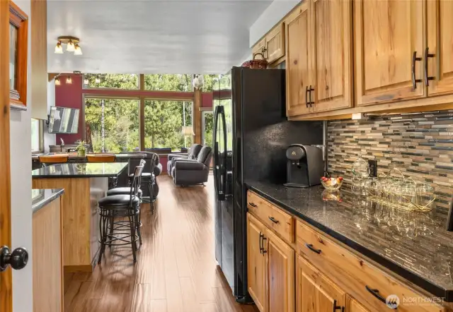 Gorgeous bamboo flooring runs throughout the main level of the cozy chalet—both beautiful and built to last.