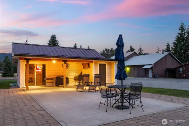 Tucked beside the main home, the cozy cabana—affectionately known as “The Lodge”—offers the perfect spot to gather, watch Seahawks games, or host patio parties!