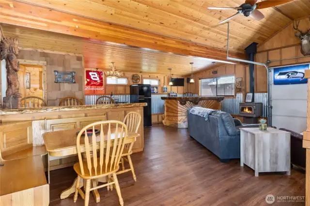 Beautifully finished with tongue-and-groove wood and a hand-carved bar, "The Lodge" is the ultimate gathering spot.