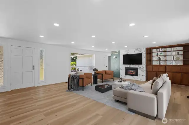 Virtually staged. Warm LVP flooring and fresh paint throughout create an inviting space.