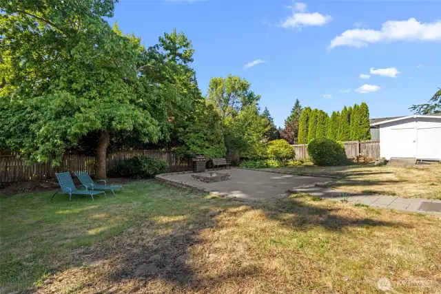 Huge fully fenced backyard—perfect for outdoor activities and safety.