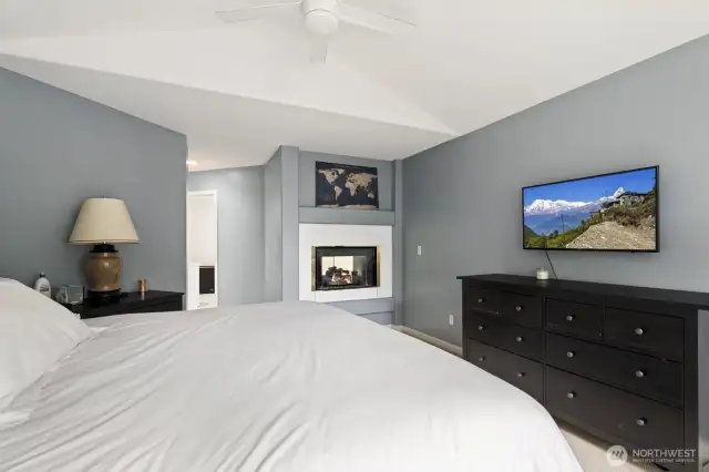 A double-sided gas fireplace and a generous walk-in closet.
