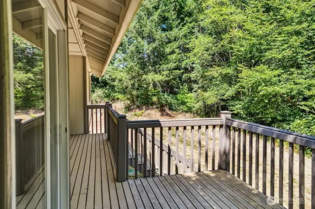 Deck off dining room with stairs to below