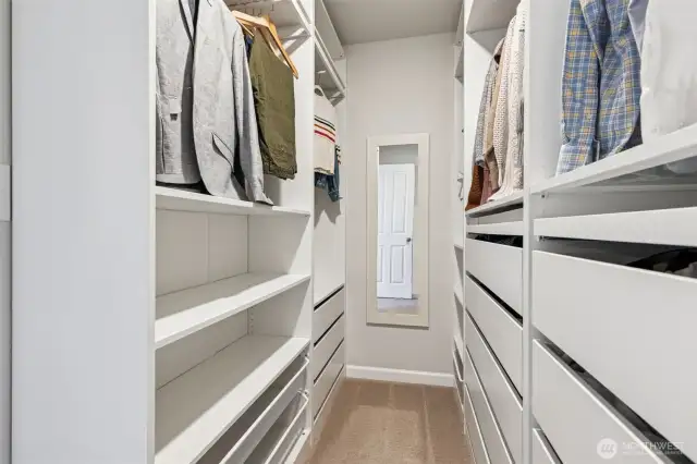 Primary walkin Closet with Custom Cabinets