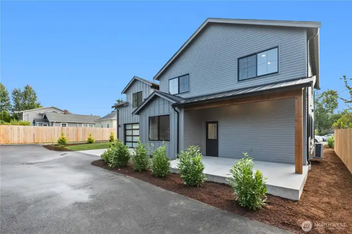 New, solid construction with metal roof & covered porch