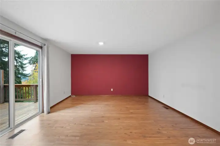 The kitchen flows into the family room with access to one of two entertaining decks