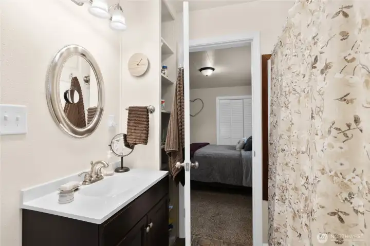 Adorable bathroom with 2 entrances. One from primary bedroom and also off main floor