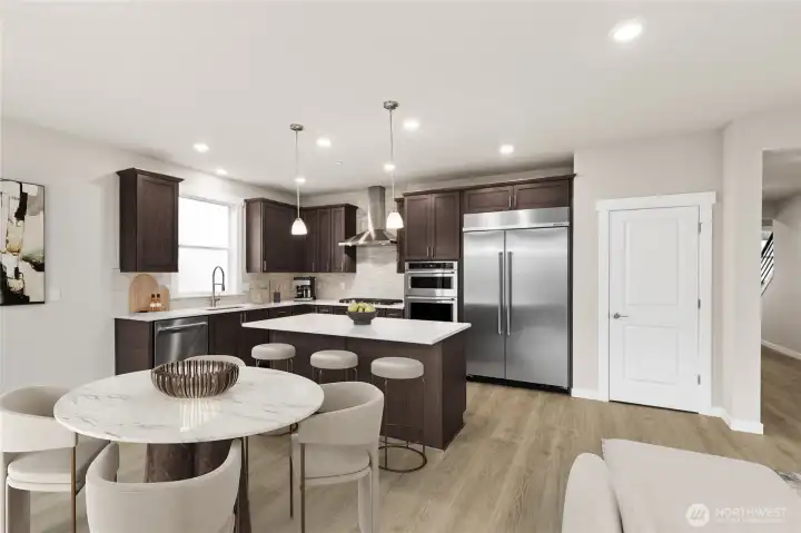 48" counter depth side by side built in refrigerator, gas cooktop and built in micro/oven. Actual home for sale may include different cabinetry. Virtually staged