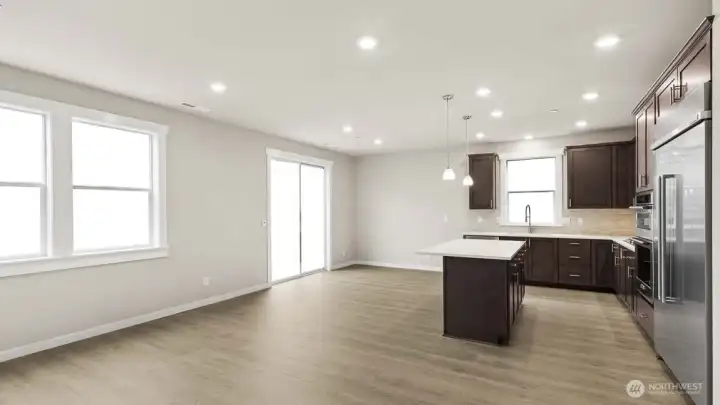 Gorgeous kitchen with plenty of storage and counter space to prep your meals or host a dinner party!  48" counter depth side by side built in refrigerator, gas cooktop and built in micro/oven.