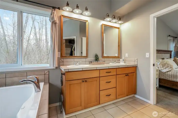 Primary bath with walk-in shower and soaking tub