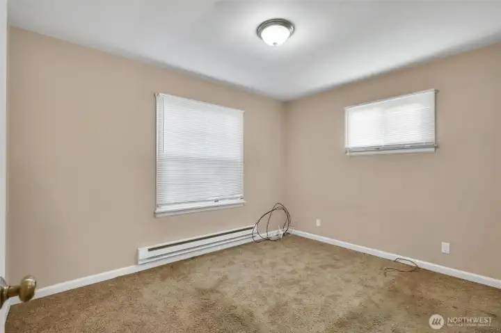 Comfortable bedroom with natural light.