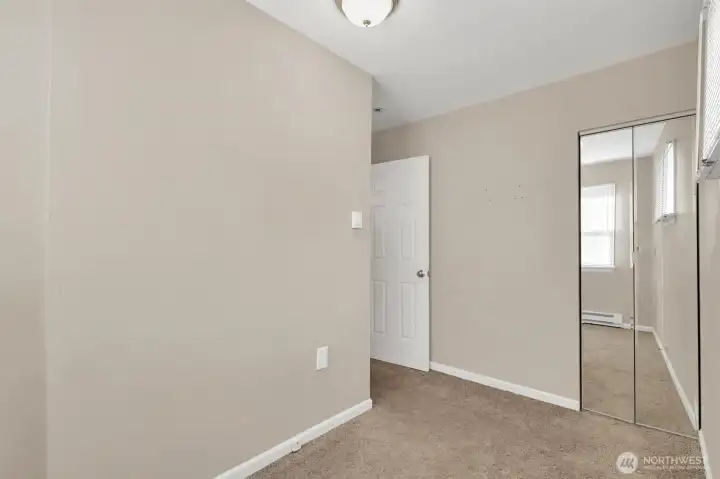 Bright bedroom with simple layout and easy furniture placement.  • Comfortable retreat with natural light and neutral tones.    For 23:    Bonus room offering versatility to fit your needs.