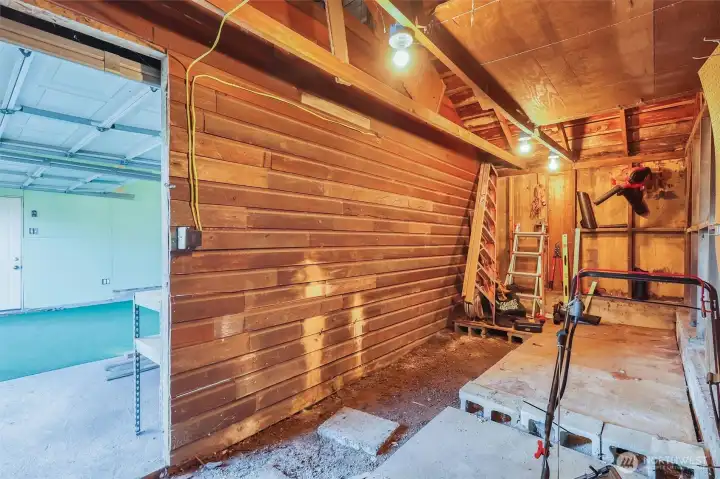 Built-in shelving for tools and organization.