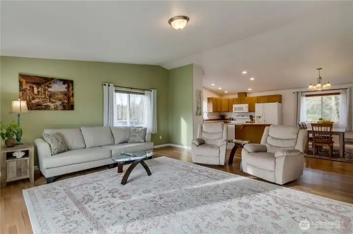 The spacious living room can accommodate various furniture arrangements.